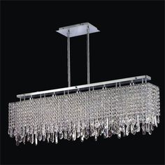 a large rectangular chandelier with crystal drops hanging from it's center bar