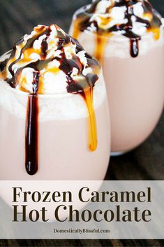 two glasses filled with ice cream and caramel drizzled in chocolate sauce