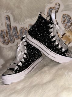 Custom Bling Converse All Star Chuck Taylor Sneakers. All designs handmade and embellished with a variety of high quality crystals. Great for weddings, proms, homecomings, birthdays, special events or just your everyday girly girl. **IF YOU NEED THIS ITEM BEFORE THE PROJECTED SHIPPING TIME YOU MUST CONTACT US BEFORE ORDERING (additional charges may apply) ** Shoe Details: Platform black and white high top Converse All Star Chuck Taylor Sneaker (cloth material style) Shoe Size: WOMEN'S size 5 to Sparkly Platform Converse, Black Sparkly Converse, Black Wedding Sneakers, Black Wedding Converse, Black Bedazzled Converse, Hoco Converse, Converse For Prom, Black And Silver Quince, Quince Converse