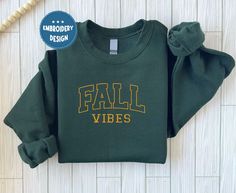 Fall Vibes Sweatshirt, Boo Embroidered Halloween Sweatshirt | Spooky Season Fun Fall Crewneck Sweater | Autumn Pullover  ABOUT US: --------------- ✔  Looking for a personalized, comfortable, and soft sweatshirt/hoodie? Then you can express yourself with our products! From color and size to unique designs, we have everything you need to create a sweatshirt/hoodie that perfectly represents you. If you have any questions, don't hesitate to contact us and we'll get back to you as soon as possible. H Varsity T-shirt With Embroidered Graphics For Fall, Varsity Long Sleeve T-shirt For Fall, Fall School Spirit T-shirt With Letter Embroidery, School Spirit Long Sleeve T-shirt For Fall, Long Sleeve School Spirit T-shirt For Fall, Long Sleeve T-shirt For School Spirit In Fall, School Spirit T-shirt With Letter Embroidery For Fall, Fall T-shirt With Embroidered Graphics For School Spirit, Fall School Spirit T-shirt With Embroidered Graphics