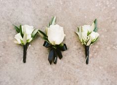 the bride's bouquets and shoes are all white