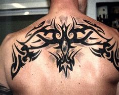 a man with a tattoo on his back