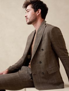 This luxurious, Italian linen suit jacket traverses all seasons thanks to its natural breathability and beautiful finish—used here in this handsome suit jacket in a timeless Prince of Wales plaid.  Finished with intricate pickstitch detailing and a half lining to ensure it stays cool and fresh even when things heat up.  Tailored Slim Fit: More relaxed than our Slim Fit, this Italian cut style has a softer shoulder construction.  Fabric from Italy's Lanificio Angelico.  Peak lapel with double-breasted closure.  Pickstitch detail.  Three exterior pockets.  Two interior pockets.  Underarm shields to reduce the need for frequent dry cleaning.  Lined through the shoulder, sleeves and front body.  Unlined back.  Tailored Slim Fit: More relaxed than our Slim Fit, this Italian cut style has a soft Timeless Double-breasted Blazer For Spring, Timeless Double-breasted Spring Blazer, Timeless Linen Outerwear With Suit Collar, Linen Double Breasted Suit With Notch Lapel For Workwear, Linen Double Breasted Suit With Suit Collar For Work, Tailored Double-breasted Linen Suit, Tailored Linen Double Breasted Suit, Linen Double Breasted Suit For Work, Linen Double-breasted Suit