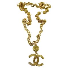 Chanel Vintage Gold Toned Logo Pendant Necklace | See more rare vintage Pendant Necklaces at https://www.1stdibs.com/jewelry/necklaces/pendant-necklaces Vintage Pendant Necklace, Chanel Necklace, Pearl Necklace Vintage, Pearl And Diamond Necklace, Gold Chanel, Star Pendant Necklace, Fame Dr, Chanel Vintage, White Gold Necklaces