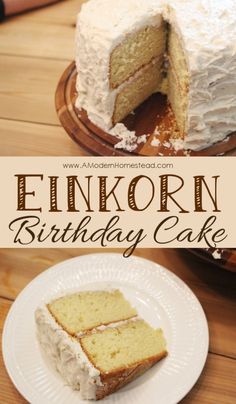 a cake with white frosting sitting on top of a wooden table