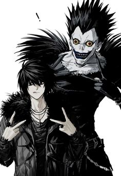 two people dressed up in black and white