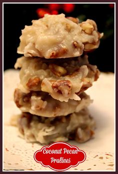 a stack of cookies sitting on top of a white doily with the words coconut pecan pralines