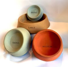 three bowls labeled with small, large and medium sizes