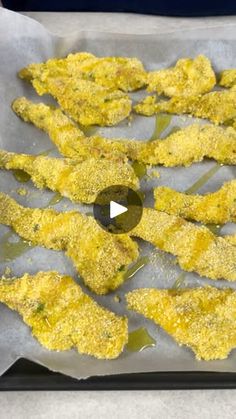 an image of fried food on a baking sheet with the video showing it's preparation