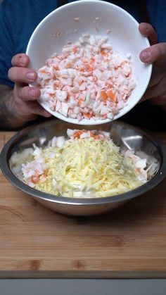 a person is holding a bowl full of food