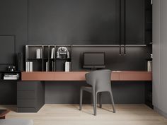 a desk with a chair and computer on it in a room that has black walls