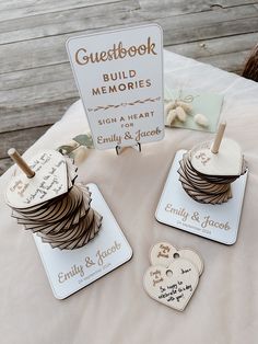 wedding guest book and memory tags on a table