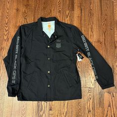 This Jacket Is In Perfect Condition! No Holes, Stains, Or Pulls Tactical Long Sleeve Outerwear For Streetwear, Nylon Tactical Long Sleeve Outerwear, Tactical Long Sleeve Nylon Outerwear, Tactical Nylon Outerwear With Long Sleeves, Black Utility Sports Outerwear, Functional Black Long Sleeve Windbreaker, Black Long Sleeve Functional Windbreaker, Black Utility Windbreaker For Outdoor, Black Tactical Outerwear With Pockets