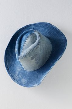 Make a bold statement with this jean-adorned cowboy hat. **Features:** Semi-structured style, washed jean fabrication, dipped crown, wide upturned brim, paneled construction **Why We | Kayce Indigo Cowboy Hat by Free People in Blue Jean Cowboy Hat, Denim Cowboy Hat, Denim Cowboy, Free People Hat, Rally Stripes, Bulky Knit, Layered Beaded Necklaces, Wool Tights, Raw Stone Earring