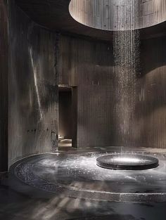 an indoor shower with water pouring from it