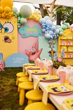 a table set up for a spongebob birthday party