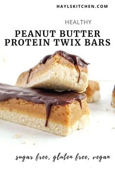 three peanut butter protein twix bars stacked on top of each other