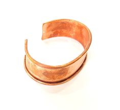 Nickel Free and Lead Free Material : Copper Color: Copper Size : 20mm Blank Size : 16.5mm Quantity : 10 pcs. To see other all Rhodium Plated Bracelet Blanks please click below https://www.etsy.com/shop/AZsupplies?search_query=Rhodium+bracelet+blank To see other all Silver Bracelet Blanks please click below https://www.etsy.com/shop/AZsupplies/search?search_query=bracelet+blank+silver&order=date_desc&view_type=list&ref=shop_search To see other all Gold Bracelet Blanks please click bel Adjustable Bronze Bracelet, Adjustable Bronze Round Bracelet, Adjustable Round Copper Cuff Bracelet, Adjustable Copper Cuff Bracelet, Adjustable Bronze Cuff Jewelry, Adjustable Thick Band Bracelet For Gift, Bronze Cuff Bracelet As Gift, Handmade Adjustable Wide Band Bracelet, Silver Copper Cuff Jewelry