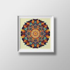 an art print on a wall with a white frame and a yellow background, depicting a colorful