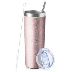 a pink tumbler with a straw in it next to the lid and an empty cup