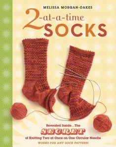 two - o - time socks book cover with red yarn and balls of thread on green background