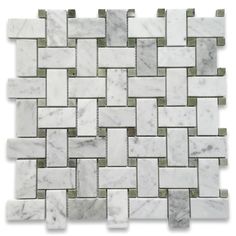 a white marble tile with green and gray accents on the edges, in an irregular pattern