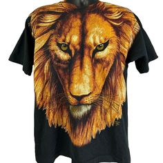 Lion Face Head Vintage 90s T Shirt Trinity African Safari Black Fruit Of The Loom Single Stitch Made In USA Graphic Tee Condition: In gently used condition. See photos. Size and Measurements: Mens/Unisex XL X-Large Width 23" - Underarm to underarm Length 28.5" - Measure from top of shoulder at the edge of collar to the bottom of the shirt College Au, Black Fruit, Lion Shirt, Usa Tee, Lion Face, African Safari, Classic Elegance, Blue Shirt, True Vintage