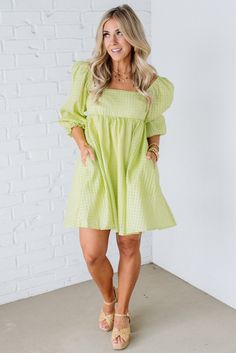 Flaunt your playful charm in the Brinley Textured Babydoll Dress. Featuring a unique basketweave texture and square neck, this dress adds a fun twist to classic styles. The elastic banded shoulder and puff sleeves add a touch of whimsy, while the babydoll silhouette and zipper back provide comfort and ease. Perfect for any occasion! 100% Polyester Lining: 100% Rayon Elastic Banded Sleeve Straight Hemline Flowy Babydoll Skirt Zipper Back Clasp at Top of Zipper SIZING: Model is 5'4" wears a size 3 Babydoll Skirt, Teen Dresses, Puffy Dresses, Skirt Zipper, Church Outfits, Dresses For Teens, Light Orange, Babydoll Dress, Above Knee