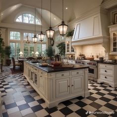 a large kitchen with black and white checkered flooring, an island in the middle