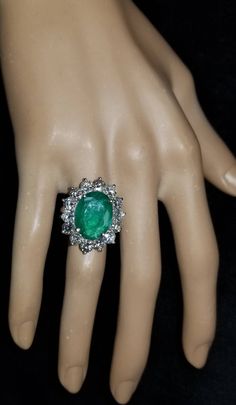 Gorgeous 14K WHITE GOLD ring natural GREEN OVAL shape weight 7.02ct. size 15.3x12mm very nice rich medium dark Green color nice luster lively , face up clean side diamonds total weight 4.27ct. H-VS ring size 7 Retail Value $28,500 net Appraisal availab Oval Green Diamond Gemstones, Green Cluster Emerald Ring Vvs Clarity, Green Cluster Emerald Ring With Vvs Clarity, Cluster Emerald Ring With Vvs Clarity, Gia Certified Green Pear-shaped Rings, Gia Certified Green Cluster Jewelry, Green Cluster Jewelry With Center Stone, Dazzling Green Emerald Oval Ring, Dazzling Oval Green Emerald Ring