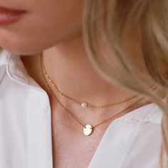 "☀️ SUMMER SALE: ADD 2 ITEMS TO CART TO GET 60% OFF! ENTER CODE: SUMMER60 AT CHECKOUT! ♥ Layered necklaces are extremely on trend right now within all fashion circles and we created our collection of already layered accessories for you. We are obsessed with this elegant set. This double chain set features a pearl choker and petite disc necklaces! ♥ H O W ∙ T O ∙ O R D E R 1.Select options from the menu (Finish) 2.Simply enter the details for engraving in the personalization box (Optional) 3.Add Double Chain Layered Necklace For Gift, Gift Double Strand Pearl Necklace With Double Chain, Double Strand Pearl Necklace With Double Chain, White Double Chain Jewelry Gift, White Double Chain Jewelry As Gift, Necklaces Pearl, Necklace Combo, Necklaces Set, Layered Necklace Set