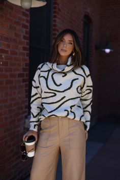 Our Oversized Abstract Sweater is the perfect blend of comfort and style. Crafted with a soft, stretchy knit and an abstract, patterned finish, this turtleneck sweater is not only unique, but provides a relaxed fit perfect for any brunch date, dinner out, or drinks with your closest friends. Trendy, versatile, and chic, you can dress it up or down, for a work look or for a casual outing. This sweater also makes a great statement piece for any wardrobe. Fabric 77% Acrylic, 22% Polyester, 4% Spand Abstract Sweater, Brunch Date, Date Dinner, Work Looks, Turtleneck Sweater, Pullover Sweaters, Sweaters & Cardigans, Turtle Neck, Hand Wash