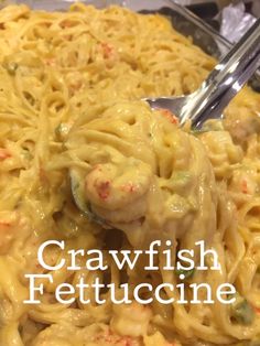 a close up of a plate of food with pasta and shrimp on it, with the words crawfish fettuccine