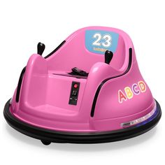 a pink bumper car with the number 23 on it's front wheel and an abcd sticker