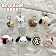 crocheted keychain drop featuring sheep, dog, and candy