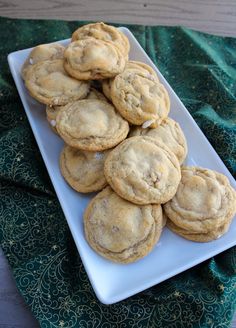 a white plate filled with cookies on top of a table