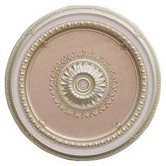 an ornate ceiling medallion in gold and white