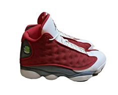 This Nike Air Jordan 13 Retro DJ5982 600 Red Flint sneaker is an ideal choice for men who love a casual and athletic look. The lace-up closure ensures that the shoe fits cozily on the foot, while the solid pattern and vibrant red color make it a great statement piece for any outfit.  Crafted in 2021, this sneaker is part of Nike's Air product line and features a silhouette that is designed to provide comfort and support during physical activity. The shoe US size 10. It is perfect for summer, fall, and spring wear. Please note:  Items are acquired from various environments including consignments, estate sales, etc. and therefore items may come from a smoker and/or pet owner/s home. Every effort is made to clean and sell quality Items.  Please bid accordingly.    Return Policy: Please look a Air Jordan 13 Retro, Jordan 13 Retro, Athletic Looks, Spring Wear, Us Size 10, Jordan 13, Shoe Fits, Physical Activity, Tie Dye T Shirts