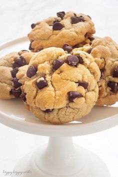 chocolate chip cookies on a white cake plate