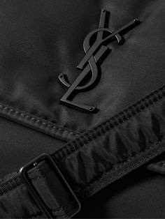 SAINT LAURENT's 'Niki' messenger bag is made from durable nylon and topped with a tonal logo plaque. It's sized to fit a tablet or small laptop and has an adjustable shoulder strap. Luxury Shoulder Bag With Logo Patch For Travel, Luxury Streetwear Bags With Logo, Luxury Logo Bags For Streetwear, Luxury Nylon Bags With Logo Patch, Nylon Shoulder Bag With Logo Patch For Travel, Saint Laurent Collection, Porter Bag, Messenger Bag For Men, Small Laptop