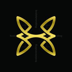 an abstract gold logo on a black background