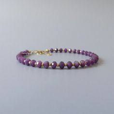 Fall in love with our delicate and rare purple sapphire gemstone beaded bracelet, perfect timeless delicate minimalist design, handmade to be stacked or worn on its own. Will make a thoughtful birthday, Christmas, or anniversary gift for your wife, mother, sister, daughter, or friend. Your purchase will arrive elegantly packed  in a gift-ready suede storage bag  and will include a complimentary cleaning cloth. Treat yourself or your loved ones with this high-quality handmade jewelry gift.  D E T 45th Anniversary Gifts, 45th Anniversary, Jewelry Minimalist, Purple Sapphire, Minimalist Gifts, Bracelet Gemstone, Anniversary Gifts For Wife, Handmade Jewelry Gift, Sapphire Bracelet