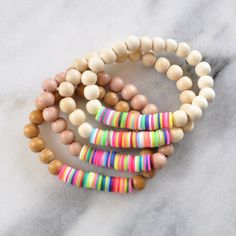 Heishi and Wood Bead Bracelet | Handmade by Libby & Smee Clear Beaded Bracelets, Heishi Bracelet Ideas, Alphabet Bracelets, Wood Beads Jewelry, Random Patterns, Clay Bracelets, Heishi Bracelet, Heishi Necklace, Disc Bracelet