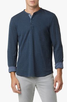 Stay cozy in style when you wear this contemporary long-sleeve henley shirt crafted from double-faced fabric. 26" length (size Small) Button half-placket Crewneck Long sleeves Curved hem 81% cotton, 19% polyester Dry clean or machine wash, tumble dry Imported Long Sleeve Henley For Fall, Casual Long Sleeve Henley With Button Closure, Fall Long Sleeve Henley, Casual Long Sleeve Henley, Casual Henley Tops With Placket, Casual Henley Neckline Top With Placket, Winter Cotton Tops With Henley Neckline, Winter Cotton Top With Henley Neckline, Casual Long Sleeve Henley For Fall