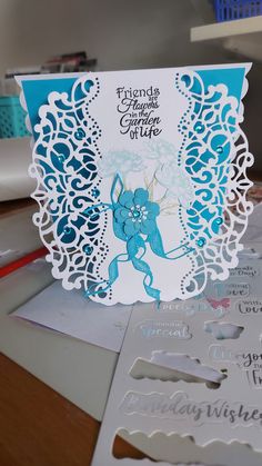 a card with an image of a blue elephant on it and some cut outs around it