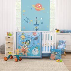 a child's room with a crib, bedding set and toy cars