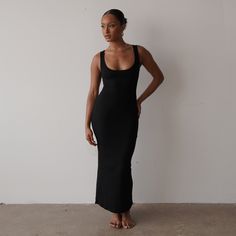 Experience ultimate comfort and style with our Staple Ribbed Maxi Dress. Made with stretchy and ribbed fabric, this versatile dress will hug your body in all the right places. Perfect for any occasion, you'll feel both comfortable and chic all day long. Runs true to size Model is wearing a size S Stretchy Made of Cotton, Poly, and Spandex Long Runs, Ribbed Maxi Dress, Maxi Dress Black, Versatile Dresses, British Indian, Ribbed Fabric, Black Maxi Dress, Dress Collection, Gq