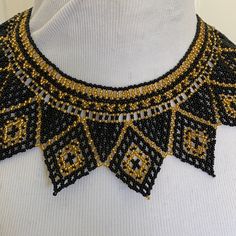 This Is An Absolutely Exquisite And Stunning Handmade Very Intricate Choker Necklace In Black And Gold Beads. Has A Hook And Eye As A Closing In The Back. It’s A Proximately 15 1/2 Inches From One End Of The Necklace To The Other. Please Check Out Pictures As They Are Part Of The Description. I Purchased This In Eastern Europe Many Years Ago But Just Never Wore It. Bohemian Black Handwoven Beaded Necklaces, Ankh Beaded Necklace, Artisan Handwoven Black Beaded Necklace, Vintage Black Beaded Choker Necklace, Egyptian Beaded Necklace, Safety Pin Crafts, Black Choker Necklace, Beaded Choker Necklace, Beaded Choker