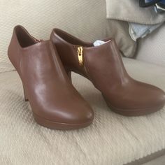 Brand New, Never Worn, Brown Leather Bootie With Side Zipper Office Boots With 4-inch Heel And Round Toe, Office Ankle Boot Heels With 4-inch Heel, Brown Ankle Boot Heels For The Office, 4-inch Heel Ankle Boot Heels For Office, 4-inch Heel Office Ankle Boots, 4-inch Heel Ankle Boot For Office, Brown Ankle-high Office Heels, Brown Ankle-high Heels For Office, Ankle-high Brown Heels For Office