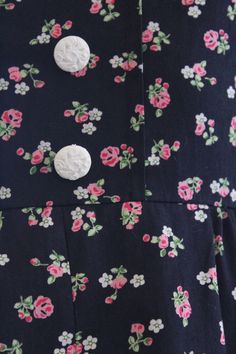 Vintage 70s cotton long dress. Black with little pink flowers. Puff sleeves, beautiful buttons. Zip on the back. 100% cotton Excellent vintage conditions. Best fit size 10 uk Model's size 6 uk, h 163 cm Vintage Cotton Dress With Ditsy Floral Print, Retro Embroidered Cotton Dress, Vintage Button-up Cotton Dress, 1970s Cotton Dress With Retro Print, Long Flower Dress, 90s Calvin Klein, Calvin Klein Black Dress, 1970s Floral Print Maxi Dress, Cotton Long Dress